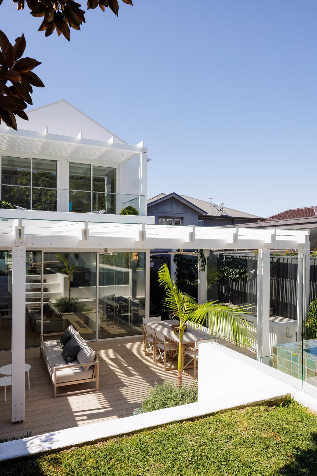 Pool and landscaped outdoor entertaining area by Structure Building